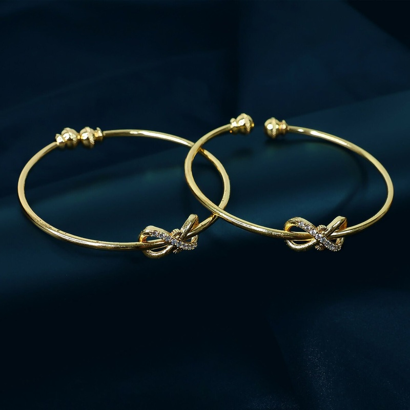 Elegant Knot Design Bangles with Stone Detailing